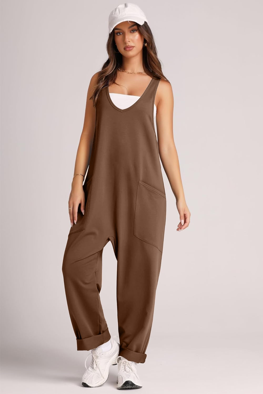 Relaxed fit chocolate jumpsuit with oversized pockets and cuffed ankles.