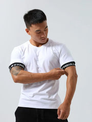 White crewneck tee with black #GYMBUCK band detail on sleeves