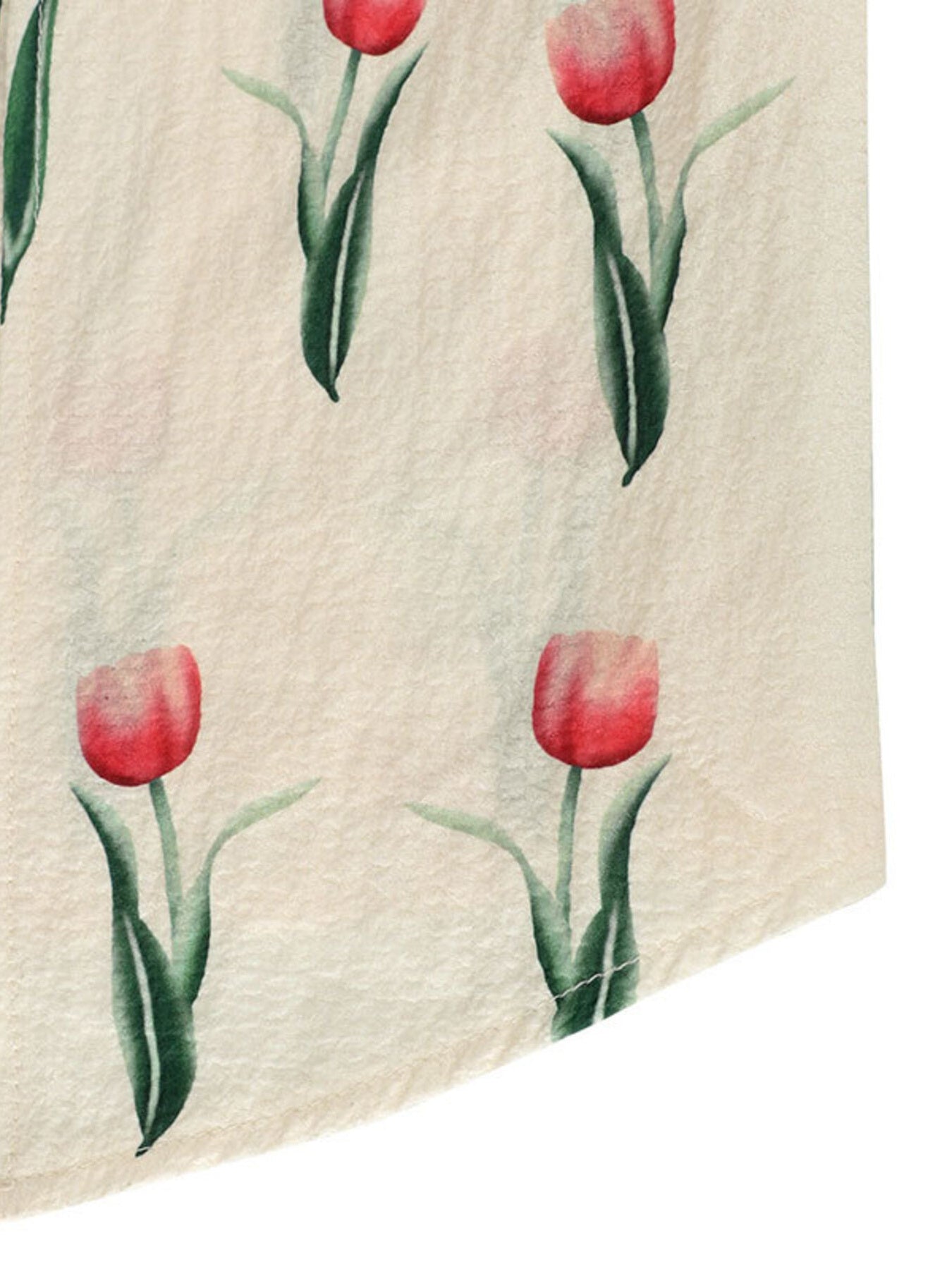 Cream midi dress with a red tulip print and textured fabric.