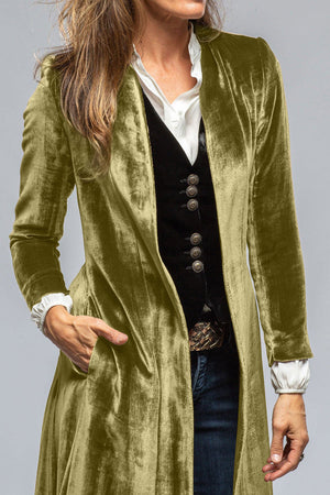 Velvet duster coat in champagne color with a dramatic split back detail.