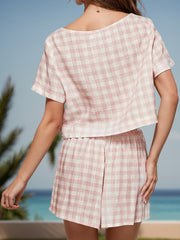 Apricot gingham crop top and shorts set with a boat neck and short sleeves.