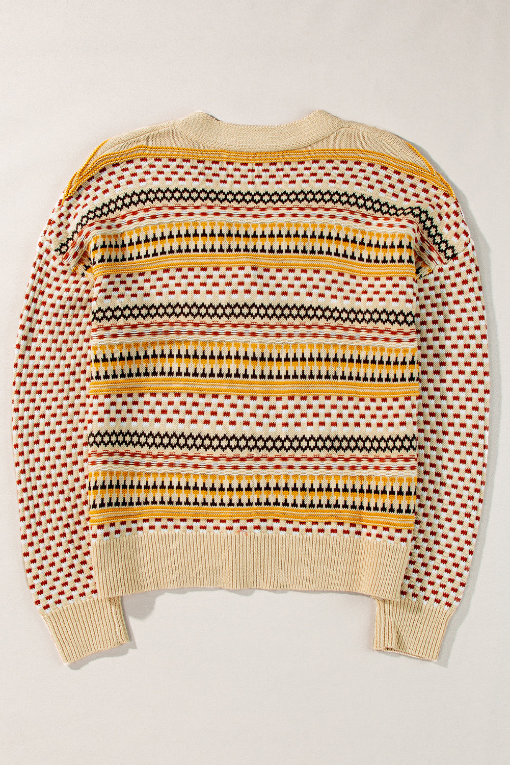 Geometric knit cropped cardigan in khaki with multicolor fair isle pattern and cream trim.