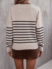 Beige striped knit sweater with black stripes and scalloped trim neckline.