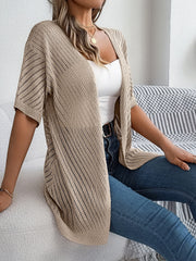 Khaki open-knit slouchy cardigan with short sleeves and a chevron pattern.
