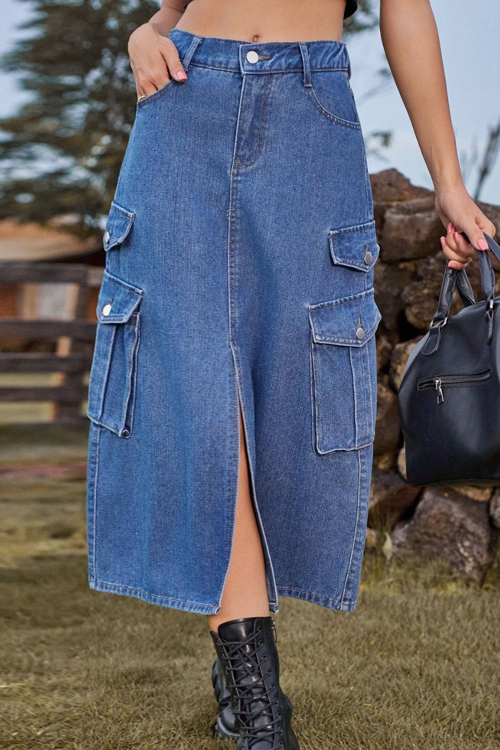 Denim midi skirt in medium blue with cargo pockets and front slit