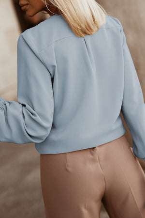 Misty Blue blouse with pleated yoke and button detail, long sleeves