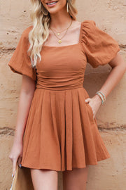 Ochre square neck romper with puff sleeves and cinched waist