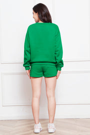 Green crewneck sweatshirt and pocket shorts loungewear set