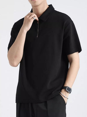 Black cotton zippered polo shirt for men with short sleeves and a classic collar.