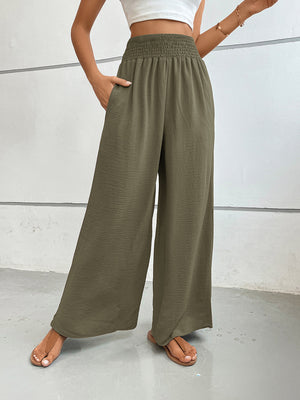 Moss green textured palazzo lounge trousers with smocked waist and pockets