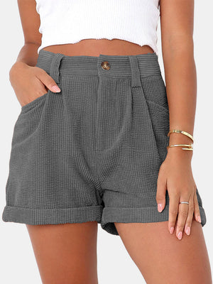 Dark Gray corduroy pleated high-waist shorts with buttoned front and cuffed hem.
