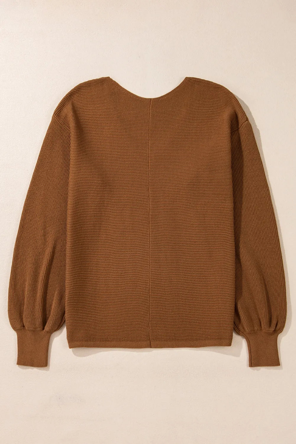 Brown ribbed knit pullover sweater with balloon sleeves and a U-neckline.