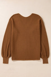 Brown ribbed knit pullover sweater with balloon sleeves and a U-neckline.