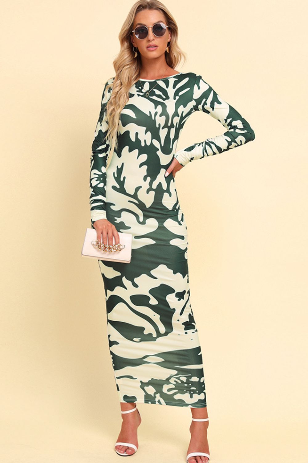 Green camouflage backless maxi dress with long sleeves and a crew neck.
