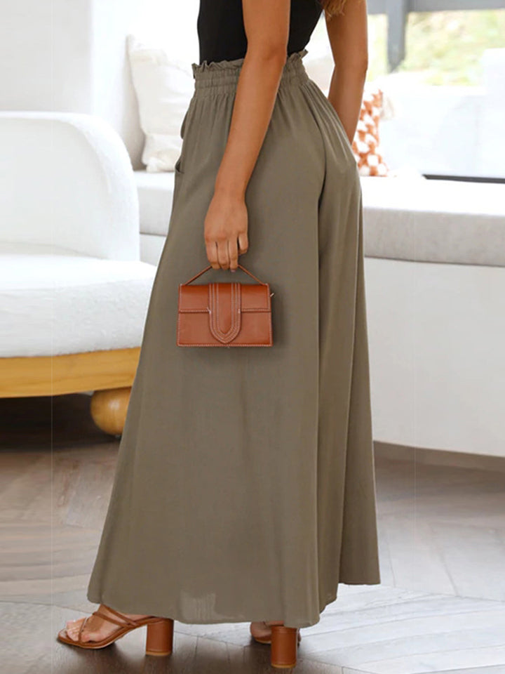 Gathered waist palazzo pants in mocha, 100% polyurethane, with a relaxed wide leg.