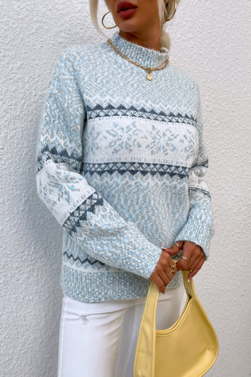 Nordic Fair Isle mock neck knit sweater in Pastel Blue with snowflake pattern.