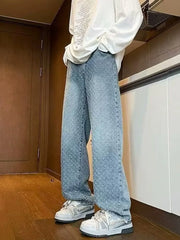 Blue relaxed wide-leg jeans with geometric print and faded wash