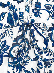 Charming floral midi dress in dark blue with drawstring waist and button front detail.