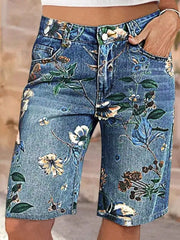 Blue botanical print relaxed fit denim shorts with a comfortable cotton blend.