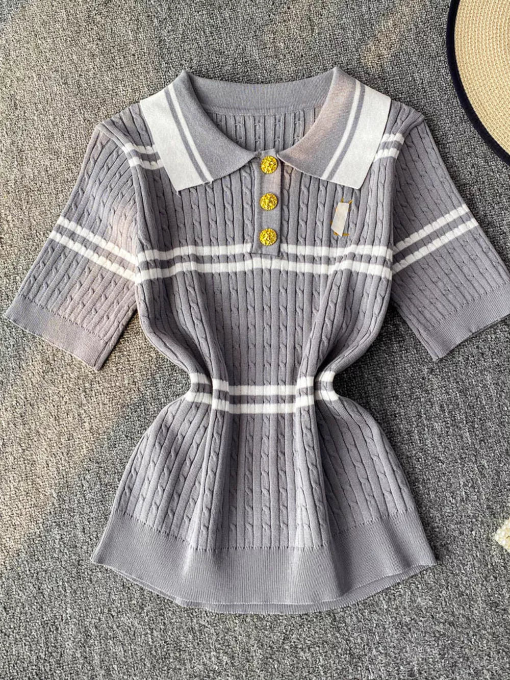 Grey cable knit polo t-shirt with white stripes and gold buttons