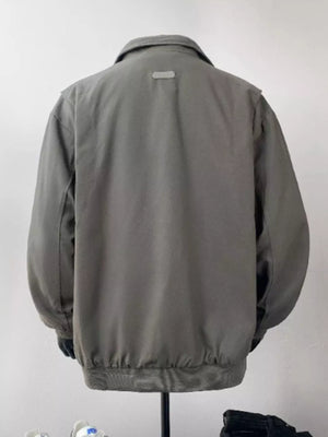 Green casual bomber jacket with a collar and elasticated cuffs and hem.