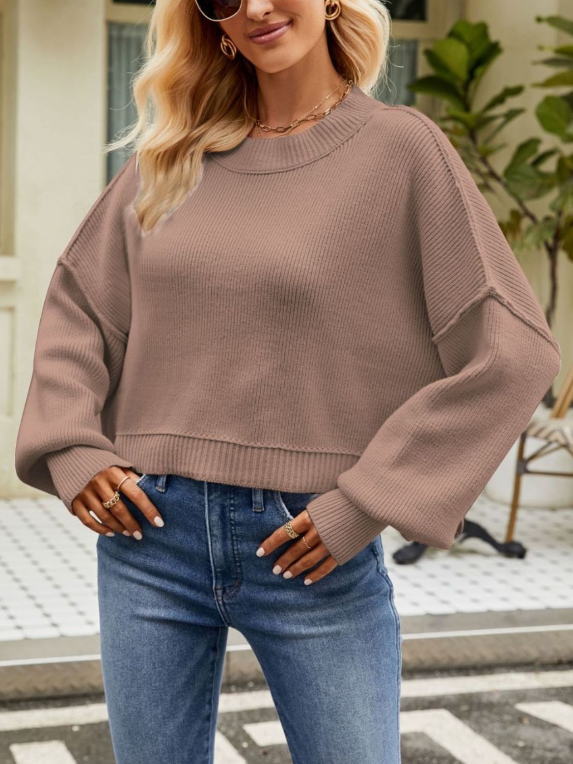 Boxy ribbed knit sweater in taupe with crewneck and dropped shoulders.