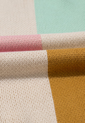 Colorblock checkerboard knit sweater in beige, blush pink, and mint green acrylic.