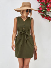 Army green button-down tie-waist sleeveless shirtdress with V-neck and buttoned pockets.