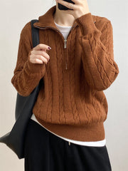 Cable knit quarter-zip pullover sweater in caramel with a silver zipper detail.