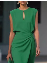 Dark green ruched dress with keyhole neckline and cap sleeves