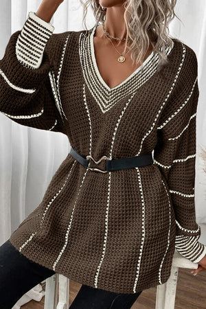 Coffee brown knit oversized V-neck dress with white vertical stripes and striped cuffs.
