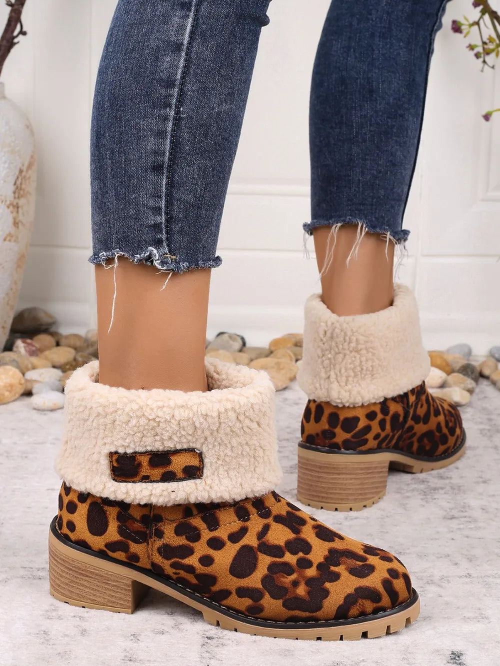 Red leopard print sherpa cuff booties with block heel.