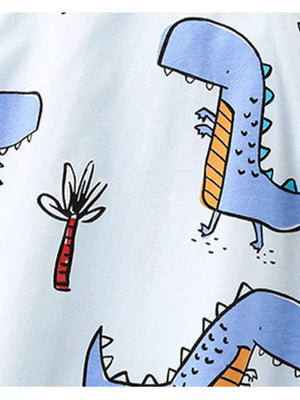 Light blue cotton t-shirt with a playful blue dinosaur and palm tree print.