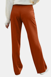 Button detail wide leg trousers in caramel, shown from the back.