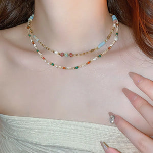 Multi-strand beaded collar necklace with multicolor gemstones and gold alloy accents