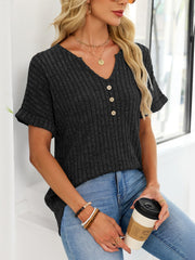Black ribbed knit short sleeve t-shirt with V-neck and decorative buttons.