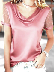 Pink cowl neck blouse with sheer, dotted sleeves and satin finish.