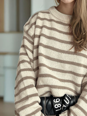 Breton stripe relaxed knit sweater in tan and white acrylic with crew neck.