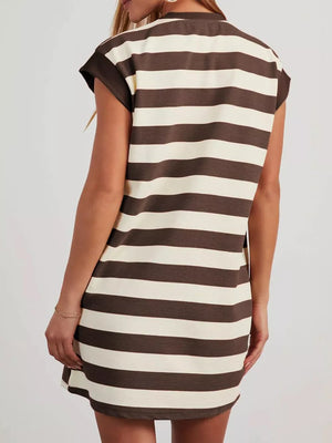 Brown and cream striped mini dress with cap sleeves and pockets.