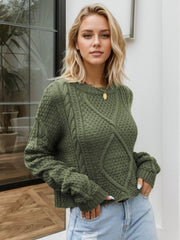 Moss green acrylic cable knit cropped sweater with textured pattern and crew neck.