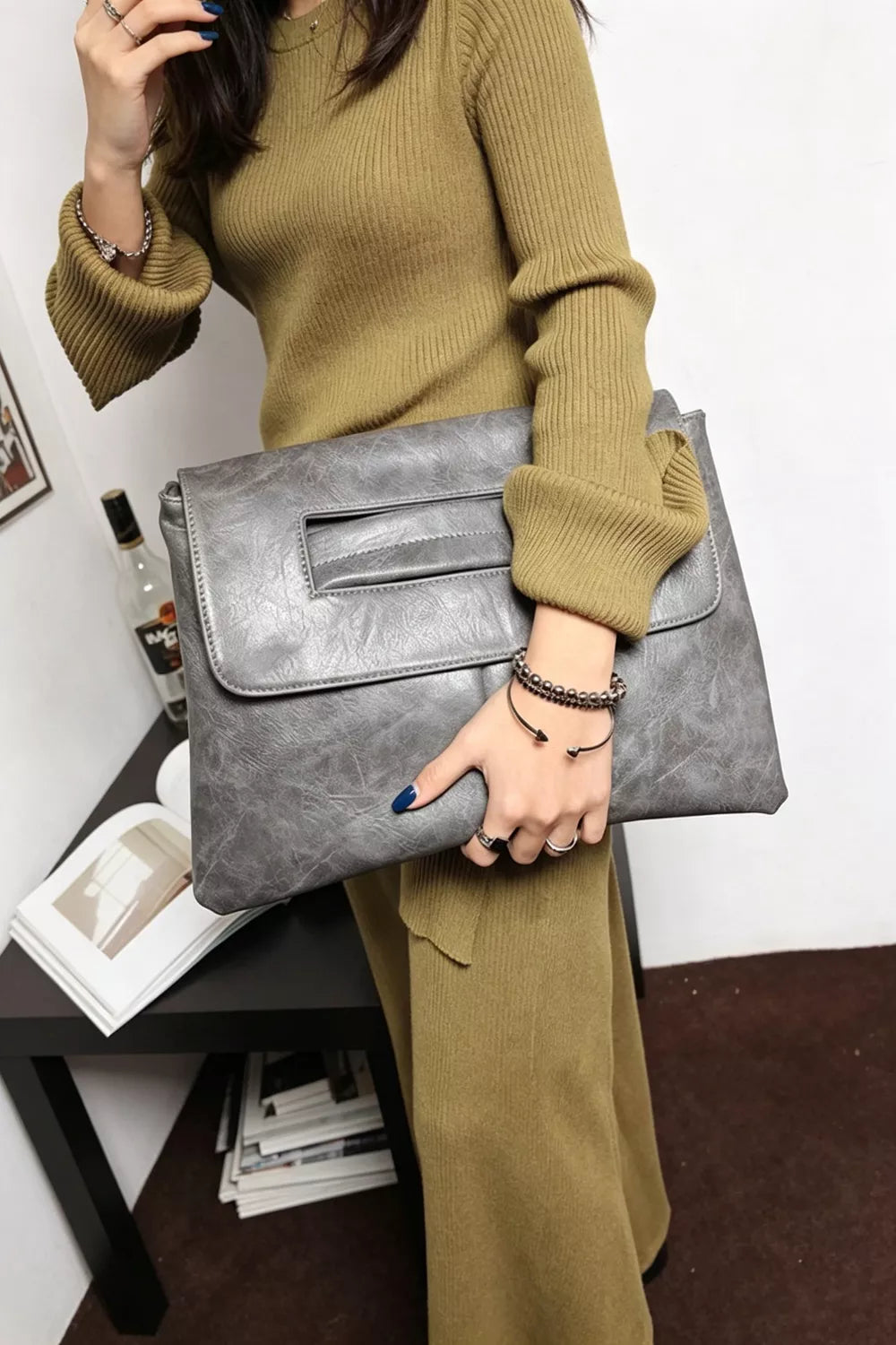 Timeless Envelope Clutch in distressed light gray leather with cut-out handle
