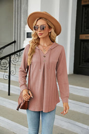 Textured henley tunic in Dusty Pink with button detail and drawstring hood.