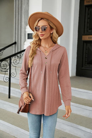 Textured henley tunic in Dusty Pink with button detail and drawstring hood.