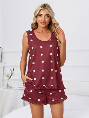 Burgundy heart print loungewear set with ruffle hem shorts and sleeveless top.