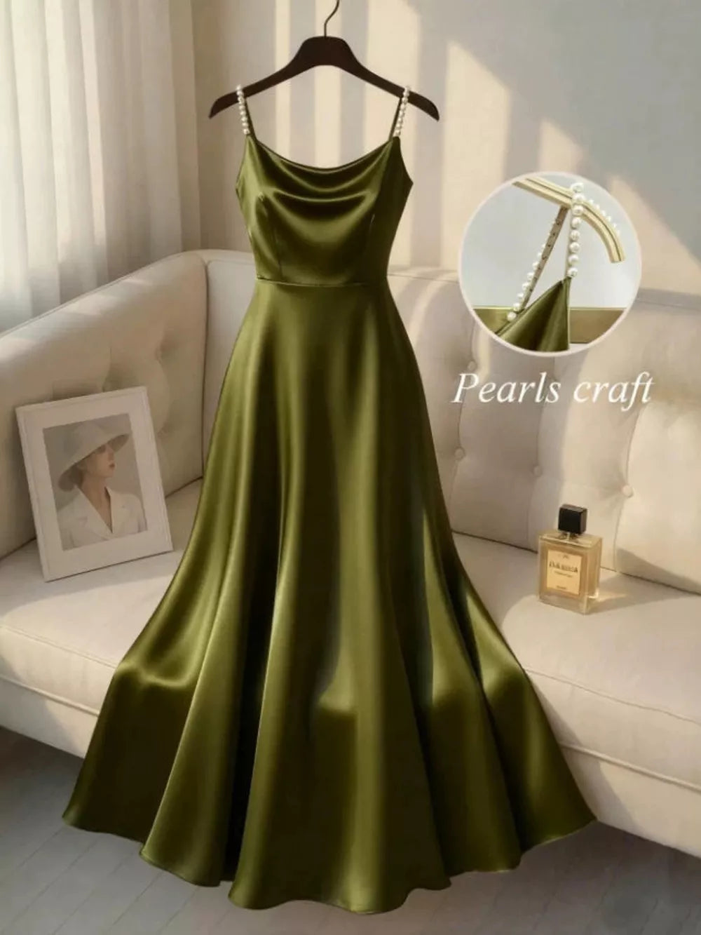 Olive green satin cami dress with pearl-embellished straps and cowl neck.