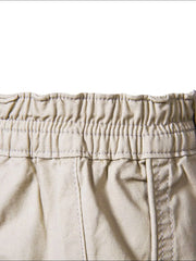 Khaki chino shorts with elastic waistband and contrast stitching detail