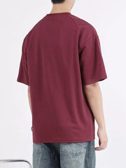 Men's dark purple cotton round neck t-shirt with short sleeves.