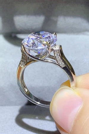 Silver moissanite solitaire ring with pavé shoulders
