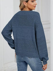 Peacock Blue knit sweater with diamond eyelet detail and V-neck.