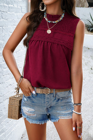 Wine textured dot yoke tank top with smocked neckline and lace trim detail.